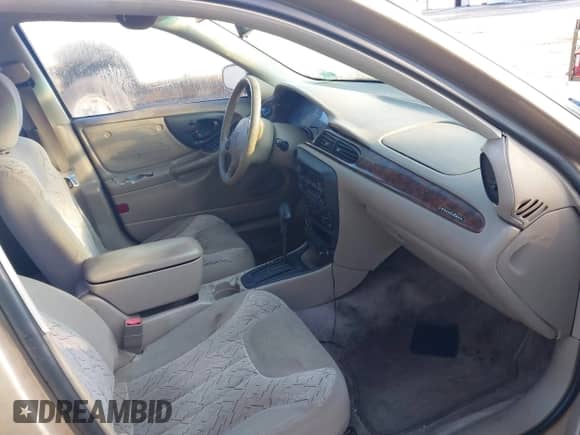 2003 Chevrolet Malibu LS z VIN 1G1NE52J03M619746, wystawiony jako IAAI lot #41471040 z przebiegiem 112 192 mil mil oraz . Historia ofert i sprzedaży dostępna na DreamBid. Obrazek 5.