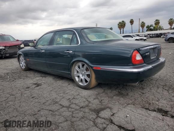 ✅ 2005 Jaguar XJ 8 LWB • VIN: SAJWA79C65SG34572 • Лот: 93790045. Опубликован ранее на Copart с пробегом 148 958 миль. Бесплатный доступ к архиву аукционных продаж из США и подробный отчёт об истории автомобиля на DreamBid. Изображение 2.