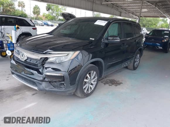✅ 2019 Honda Pilot EX-L • VIN: 5FNYF5H40KB003099 • Lot: 42224298. Wystawiony na IAAI z przebiegiem 133 358 mil. Bezpłatny archiwum sprzedaży aukcyjnych z USA i szczegółowy raport historii pojazdu na DreamBid. Zdjęcie 18.