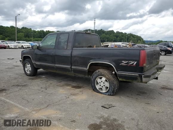 ✅ 1998 GMC Sierra 1500 • VIN: 1GTEK19R2WE559262 • Лот: 62186945. Опубликован ранее на Copart с пробегом 217 981 миль. Бесплатный доступ к архиву аукционных продаж из США и подробный отчёт об истории автомобиля на DreamBid. Изображение 2.