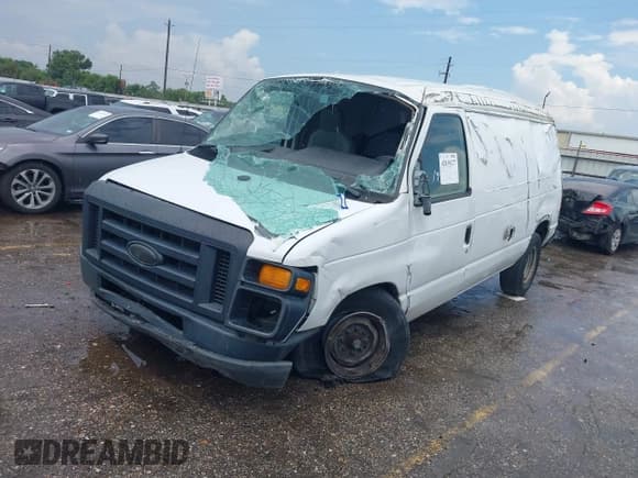 ✅ 2014 Ford Econoline Cargo Commercial • VIN: 1FTNE2EW4EDA84338 • Lot: 42830127. Listed on IAAI with 173,231 mi. Free auction sales archive from the USA and detailed vehicle history report at DreamBid. Image 16.