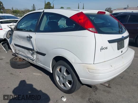 ✅ 2003 Ford Focus ZX3 • VIN: 3FAFP31ZX3R163723 • Lot: 41866542. Listed on IAAI with 83,370 mi. Free auction sales archive from the USA and detailed vehicle history report at DreamBid. Image 3.