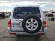 ✅ 2005 Mitsubishi Montero Limited • VIN: JA4MW51S45J001192 • Lot: 83853785. Listed on Copart with 161,247 mi. Free auction sales archive from the USA and detailed vehicle history report at DreamBid. Image 6.