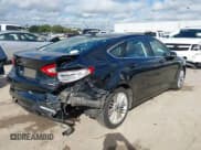 ✅ 2014 Ford Fusion SE • VIN: 3FA6P0H92ER121120 • Lot: 43624255. Listed on IAAI with 96,657 mi. Free auction sales archive from the USA and detailed vehicle history report at DreamBid. Image 4.