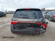 ✅ 2012 Honda Odyssey Touring • VIN: 5FNRL5H92CB083290 • Lot: 43664749. Listed on IAAI with 315,361 mi. Free auction sales archive from the USA and detailed vehicle history report at DreamBid. Image 16.