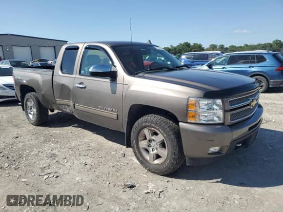 2012 Chevrolet Silverado 1500 LTZ с VIN 1GCRKTE70CZ219338, выставлен на аукционе Copart как лот 57317425 с пробегом 183 672 миль миль и Списание • Salvage title. История ставок и продаж доступна на DreamBid. Изображение 4.