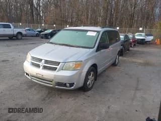 ✅ 2010 Dodge Grand Caravan Hero • VIN: 2D4RN3D12AR450238 • Lot: 43902035. Listed on IAAI with 125,288 mi. Free auction sales archive from the USA and detailed vehicle history report at DreamBid. Image 2.