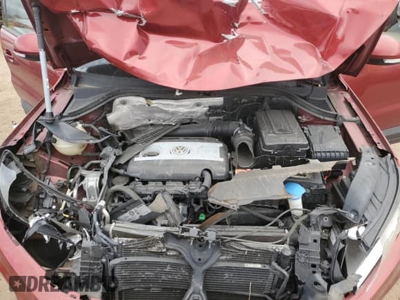 ✅ 2012 Volkswagen Tiguan S • VIN: WVGBV7AX8CW087884 • Лот: 90077175. Опубликован ранее на Copart с пробегом 147 397 миль. Бесплатный доступ к архиву аукционных продаж из США и подробный отчёт об истории автомобиля на DreamBid. Изображение 12.