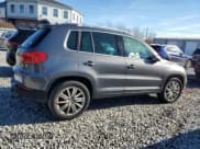 ✅ 2013 Volkswagen Tiguan S • VIN: WVGBV3AXXDW585174 • Lot: 93643875. Listed on Copart with 143,089 mi. Free auction sales archive from the USA and detailed vehicle history report at DreamBid. Image 3.