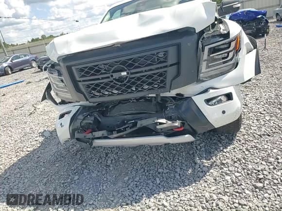 ✅ 2023 Nissan Titan Pro-4X • VIN: 1N6AA1ED0PN108003 • Лот: 64693365. Опубликован ранее на Copart с пробегом 61 188 миль. Бесплатный доступ к архиву аукционных продаж из США и подробный отчёт об истории автомобиля на DreamBid. Изображение 13.