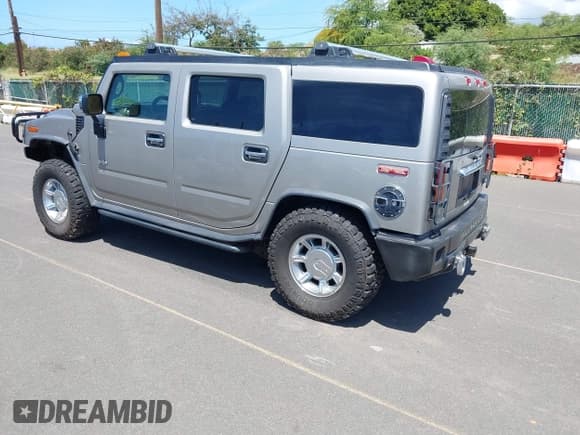 ✅ 2003 Hummer H2 • VIN: 5GRGN23U33H102150 • Лот: 41892529. Опубликован ранее на IAAI с пробегом Не указан. Бесплатный доступ к архиву аукционных продаж из США и подробный отчёт об истории автомобиля на DreamBid. Изображение 3.