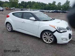 ✅ 2013 Hyundai Veloster w/Gray Int • VIN: KMHTC6AD0DU151892 • Lot: 43034606. Wystawiony na IAAI z przebiegiem 138 148 mil. Bezpłatny archiwum sprzedaży aukcyjnych z USA i szczegółowy raport historii pojazdu na DreamBid. Zdjęcie 1.