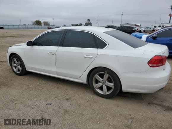 ✅ 2013 Volkswagen Passat SE • VIN: 1VWBP7A39DC096590 • Lot: 82689945. Listed on Copart with 151,870 mi. Free auction sales archive from the USA and detailed vehicle history report at DreamBid. Image 2.