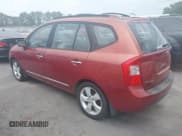 ✅ 2007 Kia Rondo EX • VIN: KNAFG526077116012 • Lot: 43106317. Wystawiony na IAAI z przebiegiem 61 104 mil. Bezpłatny archiwum sprzedaży aukcyjnych z USA i szczegółowy raport historii pojazdu na DreamBid. Zdjęcie 3.
