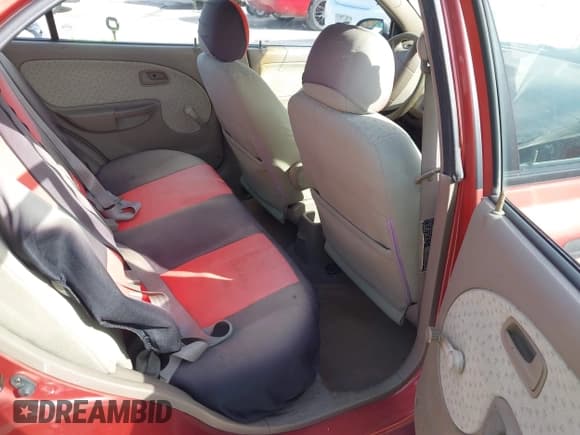 ✅ 2003 Kia Rio • VIN: KNADC125436239329 • Lot: 41321620. Listed on IAAI with 92,306 mi. Free auction sales archive from the USA and detailed vehicle history report at DreamBid. Image 8.