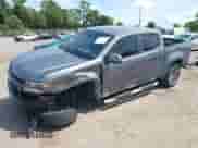 2021 Chevrolet Colorado 2WD Work Truck with VIN 1GCGSBEA4M1100950, listed as a IAAI auction lot 43116905 with 93,281 mi miles and . Bid and sale history available at DreamBid. Image 2.