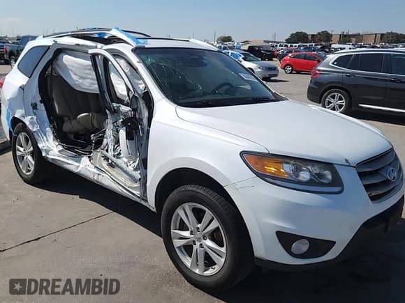 ✅ 2012 Hyundai Santa Fe Limited • VIN: 5XYZK4AG6CG118024 • Lot: 86480585. Listed on Copart with 175,487 mi. Free auction sales archive from the USA and detailed vehicle history report at DreamBid. Image 15.