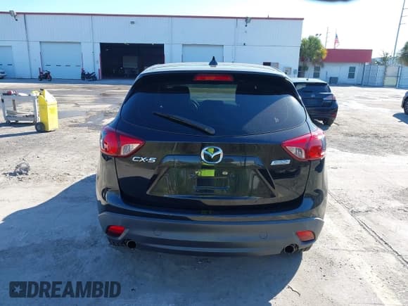✅ 2016 Mazda CX-5 Sport • VIN: JM3KE2BY8G0715795 • Lot: 43562802. Listed on IAAI with 129,307 mi. Free auction sales archive from the USA and detailed vehicle history report at DreamBid. Image 17.