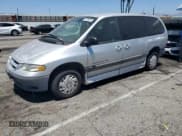 ✅ 2000 Dodge Caravan SE • VIN: 1B4GP44R0YB528936 • Lot: 64148625. Listed on Copart with 84,596 mi. Free auction sales archive from the USA and detailed vehicle history report at DreamBid. Image 1.