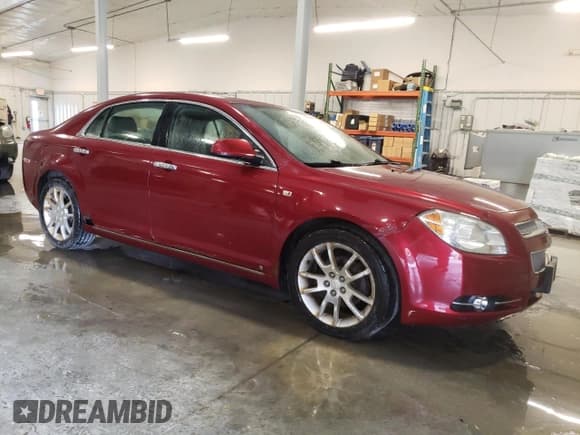 ✅ 2008 Chevrolet Malibu LTZ • VIN: 1G1ZK57728F154812 • Lot: 75428144. Listed on Copart with 197,645 mi. Free auction sales archive from the USA and detailed vehicle history report at DreamBid. Image 4.