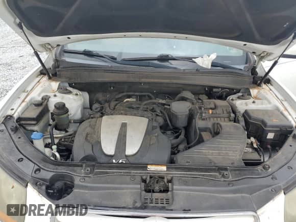 2011 Hyundai Santa Fe Limited с VIN 5XYZKDAG4BG088911, выставлен на аукционе Copart как лот 72110384 с пробегом 209 249 миль миль и Списание • Salvage title. История ставок и продаж доступна на DreamBid. Изображение 11.