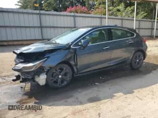 2018 Chevrolet Cruze Premier z VIN 3G1BF6SM6JS609610, wystawiony jako Copart lot #81042825 z przebiegiem 166 989 mil mil oraz Szkoda całkowita • Salvage title. Historia ofert i sprzedaży dostępna na DreamBid. Obrazek 1.