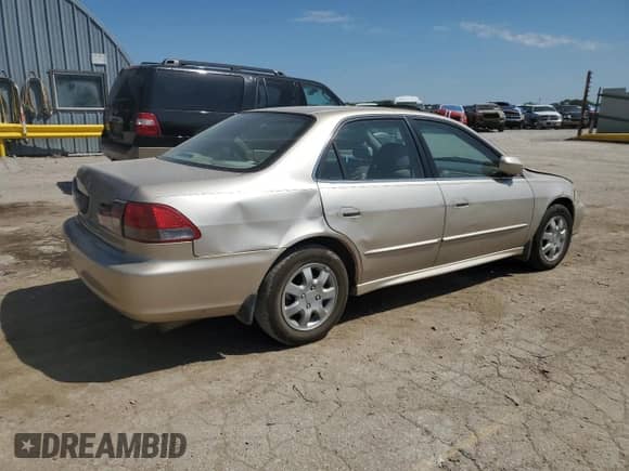 2002 Honda Accord EX с VIN 1HGCG56682A104803, выставлен на аукционе Copart как лот 70052125 с пробегом 277 321 миль миль и Списание • Salvage title. История ставок и продаж доступна на DreamBid. Изображение 3.