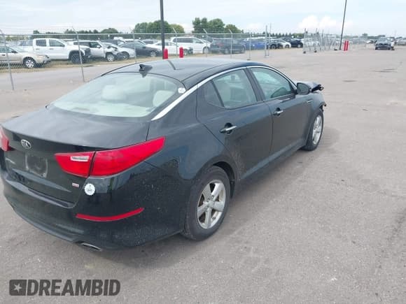 ✅ 2014 Kia Optima LX • VIN: 5XXGM4A7XEG340798 • Lot: 43241109. Listed on IAAI with 113,855 mi. Free auction sales archive from the USA and detailed vehicle history report at DreamBid. Image 4.