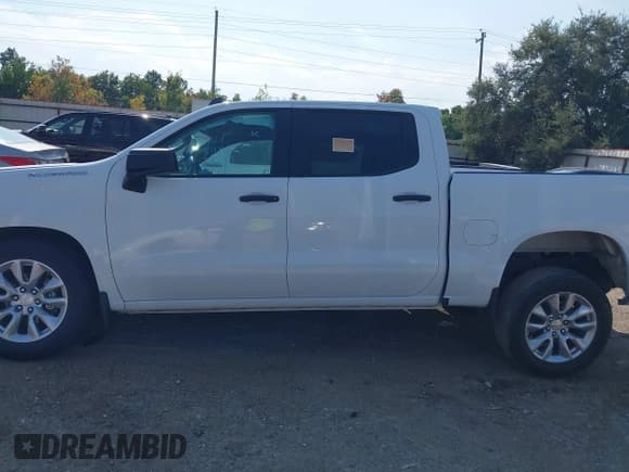 ✅ 2023 Chevrolet Silverado 1500 Custom • VIN: 3GCPABEK7PG280894 • Lot: 43206042. Wystawiony na IAAI z przebiegiem 27 359 mil. Bezpłatny archiwum sprzedaży aukcyjnych z USA i szczegółowy raport historii pojazdu na DreamBid. Zdjęcie 14.