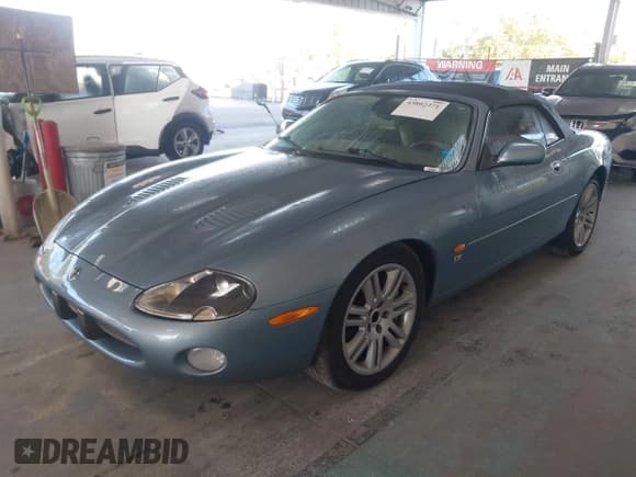 ✅ 2003 Jaguar XK • VIN: SAJDA42BX33A34653 • Лот: 43802371. Опубликован ранее на IAAI с пробегом 112 992 миль. Бесплатный доступ к архиву аукционных продаж из США и подробный отчёт об истории автомобиля на DreamBid. Изображение 2.
