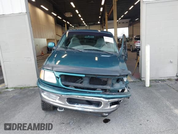 ✅ 1997 Ford F-150 XL • VIN: 1FTEX18L1VKB44867 • Lot: 41266572. Listed on IAAI with 105,061 mi. Free auction sales archive from the USA and detailed vehicle history report at DreamBid. Image 12.
