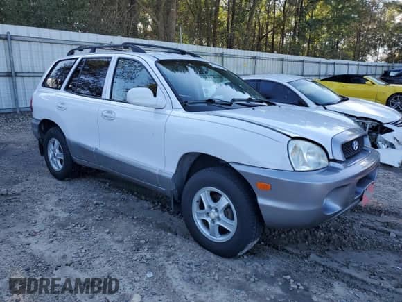 2001 Hyundai Santa Fe GLS z VIN KM8SC83D91U084712, wystawiony jako Copart lot #87107674 z przebiegiem 111 465 mil mil oraz Czysty tytuł • Clean title. Historia ofert i sprzedaży dostępna na DreamBid. Obrazek 4.
