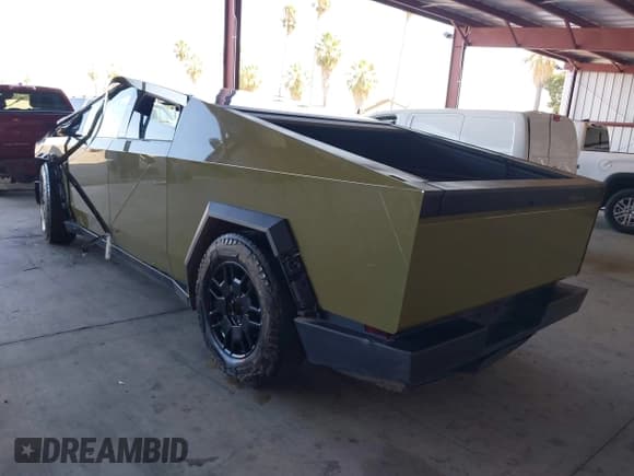 ✅ 2024 Tesla Cybertruck • VIN: 7G2CEHED0RA006320 • Lot: 42956257. Listed on IAAI with 28,757 mi. Free auction sales archive from the USA and detailed vehicle history report at DreamBid. Image 3.