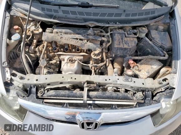 ✅ 2010 Honda Civic DX-VP • VIN: 2HGFA1E33AH521440 • Lot: 64039905. Listed on Copart with 141,690 mi. Free auction sales archive from the USA and detailed vehicle history report at DreamBid. Image 11.