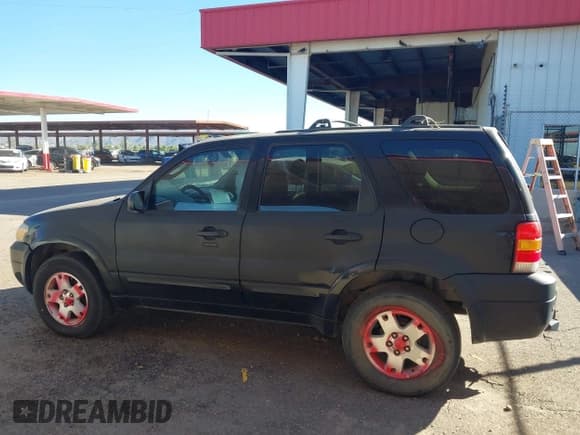 ✅ 2007 Ford Escape Limited • VIN: 1FMCU04137KA13520 • Lot: 43419709. Listed on IAAI with 238,111 mi. Free auction sales archive from the USA and detailed vehicle history report at DreamBid. Image 14.