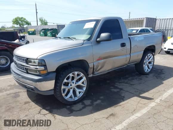 2002 Chevrolet Silverado 1500 LS z VIN 1GCEK14V12Z277928, wystawiony jako IAAI lot #42049150 z przebiegiem 198 414 mil mil oraz . Historia ofert i sprzedaży dostępna na DreamBid. Obrazek 2.