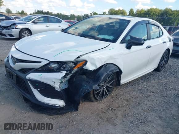 2021 Toyota Camry SE with VIN 4T1T11BK7MU024885, listed as a IAAI auction lot 43113875 with 62,020 mi miles and . Bid and sale history available at DreamBid. Image 2.