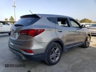 ✅ 2018 Hyundai Santa Fe 2.4L • VIN: 5NMZT3LB6JH095209 • Лот: 66211623. Опубликован ранее на Copart с пробегом 57 947 миль. Бесплатный доступ к архиву аукционных продаж из США и подробный отчёт об истории автомобиля на DreamBid. Изображение 3.
