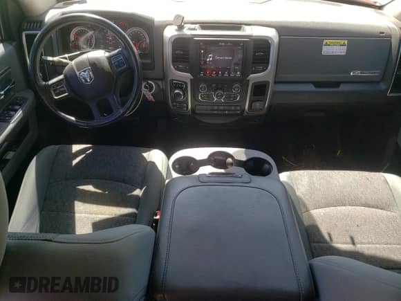 2018 Ram 1500 SLT with VIN 1C6RR7GT3JS348541, listed as a Copart auction lot 57144935 with 105,497 mi miles and Salvage title. Bid and sale history available at DreamBid. Image 8.