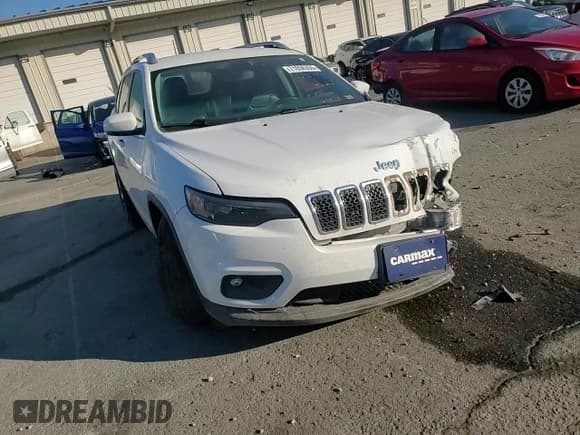 ✅ 2019 Jeep Cherokee Latitude Plus • VIN: 1C4PJLLB4KD275361 • Lot: 71656355. Listed on Copart with 83,869 mi. Free auction sales archive from the USA and detailed vehicle history report at DreamBid. Image 14.