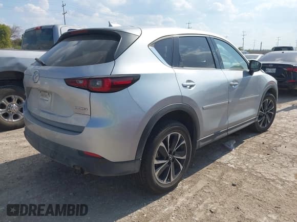 ✅ 2023 Mazda CX-5 S Premium • VIN: JM3KFBDM5P0124377 • Lot: 43347513. Wystawiony na IAAI z przebiegiem 43 428 mil. Bezpłatny archiwum sprzedaży aukcyjnych z USA i szczegółowy raport historii pojazdu na DreamBid. Zdjęcie 4.