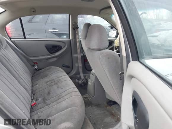 2003 Chevrolet Malibu z VIN 1G1ND52J63M702679, wystawiony jako IAAI lot #41469911 z przebiegiem 54 592 mil mil oraz . Historia ofert i sprzedaży dostępna na DreamBid. Obrazek 8.