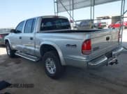 ✅ 2002 Dodge Dakota SLT • VIN: 1B7HG48N62S546119 • Lot: 41826998. Wystawiony na IAAI z przebiegiem 157 761 mil. Bezpłatny archiwum sprzedaży aukcyjnych z USA i szczegółowy raport historii pojazdu na DreamBid. Zdjęcie 3.