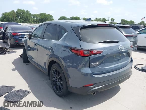 ✅ 2023 Mazda CX-5 S Carbon Edition • VIN: JM3KFBCMXP0136901 • Lot: 42630209. Listed on IAAI with 22,519 mi. Free auction sales archive from the USA and detailed vehicle history report at DreamBid. Image 3.
