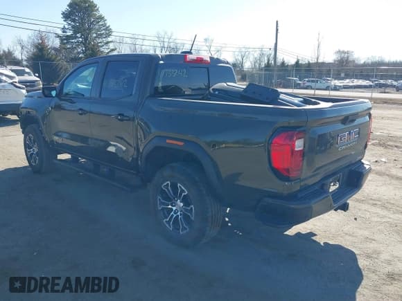 ✅ 2023 GMC Canyon 4WD AT4 • VIN: 1GTP6DEK1P1174713 • Lot: 41733242. Listed on IAAI with 35,705 mi. Free auction sales archive from the USA and detailed vehicle history report at DreamBid. Image 3.