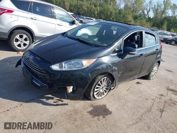✅ 2014 Ford Fiesta Titanium • VIN: 3FADP4FJ0EM200164 • Lot: 43450345. Wystawiony na IAAI z przebiegiem 107 553 mil. Bezpłatny archiwum sprzedaży aukcyjnych z USA i szczegółowy raport historii pojazdu na DreamBid. Zdjęcie 17.