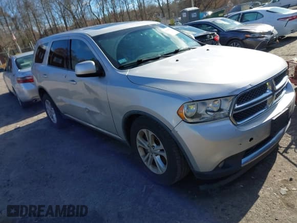 ✅ 2012 Dodge Durango SXT • VIN: 1C4RDJAG9CC112313 • Lot: 43709220. Listed on IAAI with 148,676 mi. Free auction sales archive from the USA and detailed vehicle history report at DreamBid. Image 1.