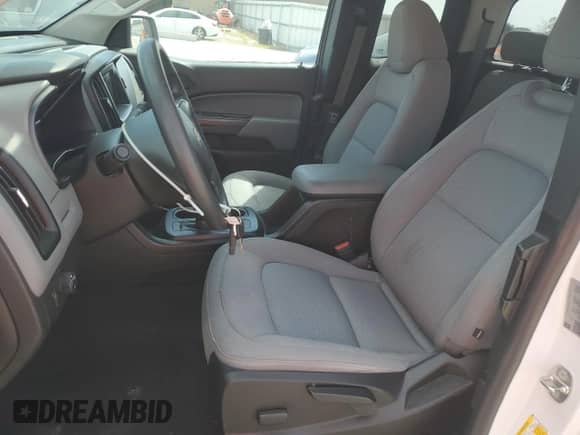 2019 Chevrolet Colorado 2WD Work Truck with VIN 1GCHSBEN7K1152092, listed as a Copart auction lot 71048095 with 76,279 mi miles and Salvage title. Bid and sale history available at DreamBid. Image 7.