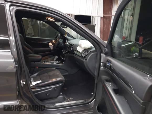 2019 Jeep Grand Cherokee Trailhawk with VIN 1C4RJFLT6KC750131, listed as a IAAI auction lot 43332562 with 46,789 mi miles and . Bid and sale history available at DreamBid. Image 5.