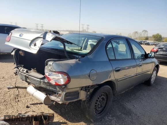 2003 Chevrolet Malibu with VIN 1G1ND52J83M648169, listed as a Copart auction lot 74711844 with 156,544 mi miles and Salvage title. Bid and sale history available at DreamBid. Image 3.